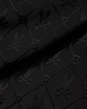 Mens Garry Jacquard Sweatshort in black, featuring a tonal all-over jacquard knit pattern of the iconic Psycho Bunny skull logo and PB initials. (6)