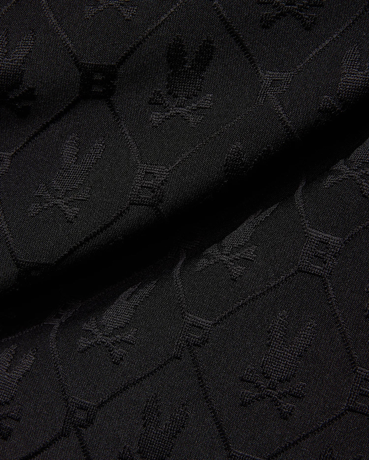 Mens Garry Jacquard Sweatshort in black, featuring a tonal all-over jacquard knit pattern of the iconic Psycho Bunny skull logo and PB initials. (6)