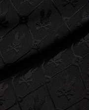 Mens Garry Jacquard Sweatshort in black, featuring a tonal all-over jacquard knit pattern of the iconic Psycho Bunny skull logo and PB initials. (6)