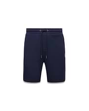 Mens Gabe French Terry Sweatshort in navy blue, featuring a relaxed fit, drawstring waist, and a small white embroidered Psycho Bunny skull logo on the lower left leg. (6)