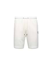 Mens Gabe French Terry Sweatshort in cream, featuring a relaxed fit, soft French terry fabric, elastic drawstring waist with silver eyelets, and a small embroidered black Psycho Bunny skull logo on the left thigh. (5)