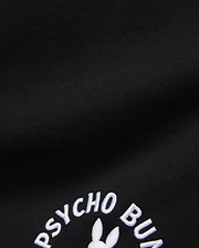 Mens Stevie Short in black, crafted from a smooth, dense knit fabric, prominently featuring the iconic white embroidered Psycho Bunny text and partial bunny skull logo.
