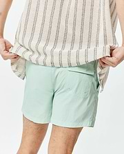 Mens Neo Swim Trunk 4, a light mint green, relaxed fit swim short crafted from crinkled nylon fabric, featuring a back flap pocket and side pockets. (3)