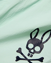Mens Neo Swim Trunk 4 in vibrant mint green, crafted from lightweight, crinkled fabric, featuring a bold, large black Psycho Bunny skull and crossbones logo prominently displayed. (6)