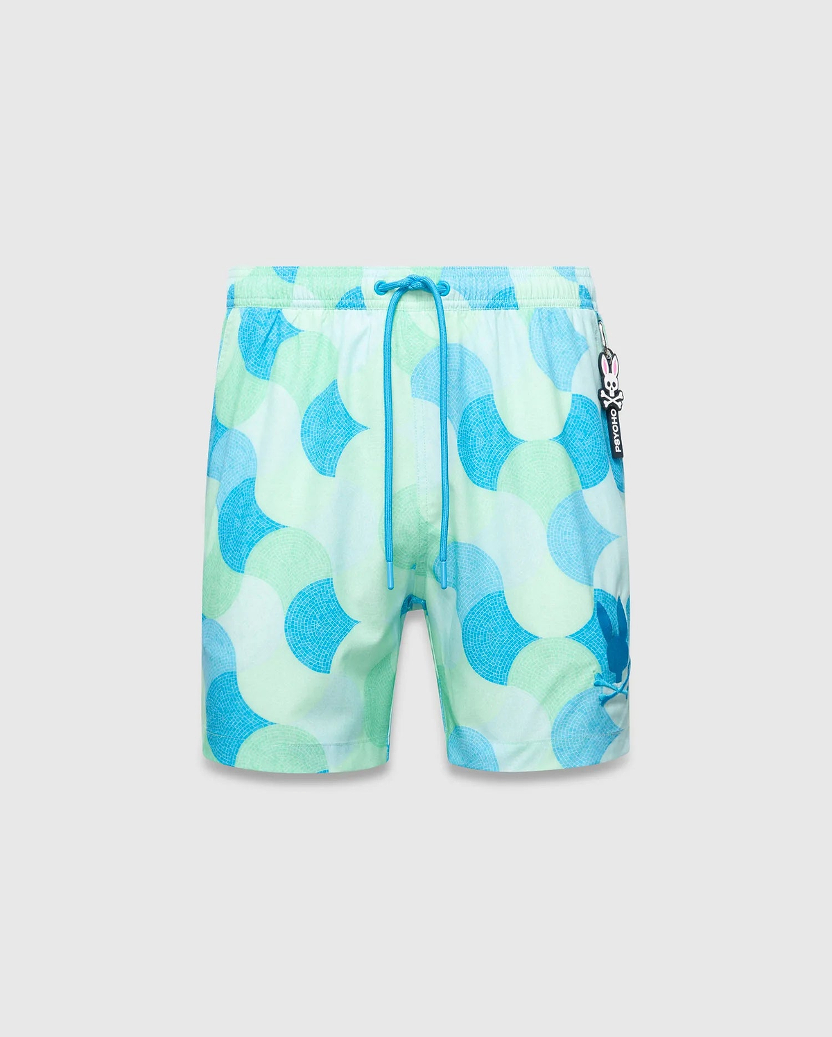 Mens Ethan Swim Trunk 6 with a vibrant green, blue, and white mosaic wave pattern, featuring a dark blue drawstring, a subtle large Psycho Bunny logo on the right leg, and a small Psycho Bunny skull charm.