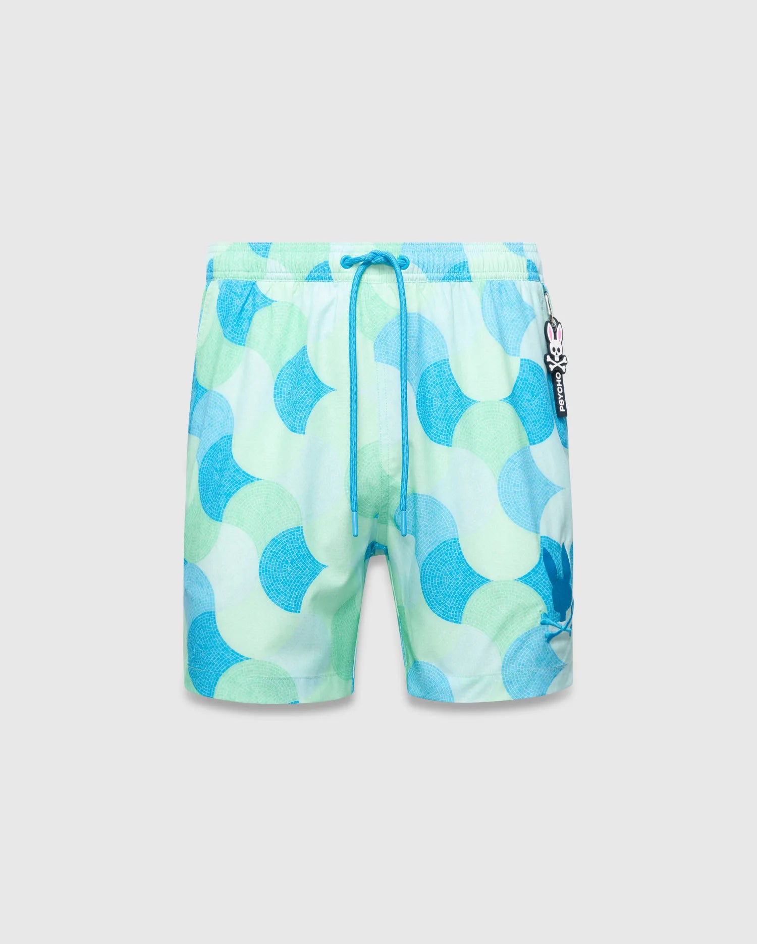 Mens Ethan Swim Trunk 6 with a vibrant green, blue, and white mosaic wave pattern, featuring a dark blue drawstring, a subtle large Psycho Bunny logo on the right leg, and a small Psycho Bunny skull charm.