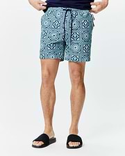 Mens Frank Swim Trunk 6, aqua and navy blue with an all-over geometric pattern featuring the Psycho Bunny skull logo, classic fit, quick-dry fabric, and navy drawstring. (1)