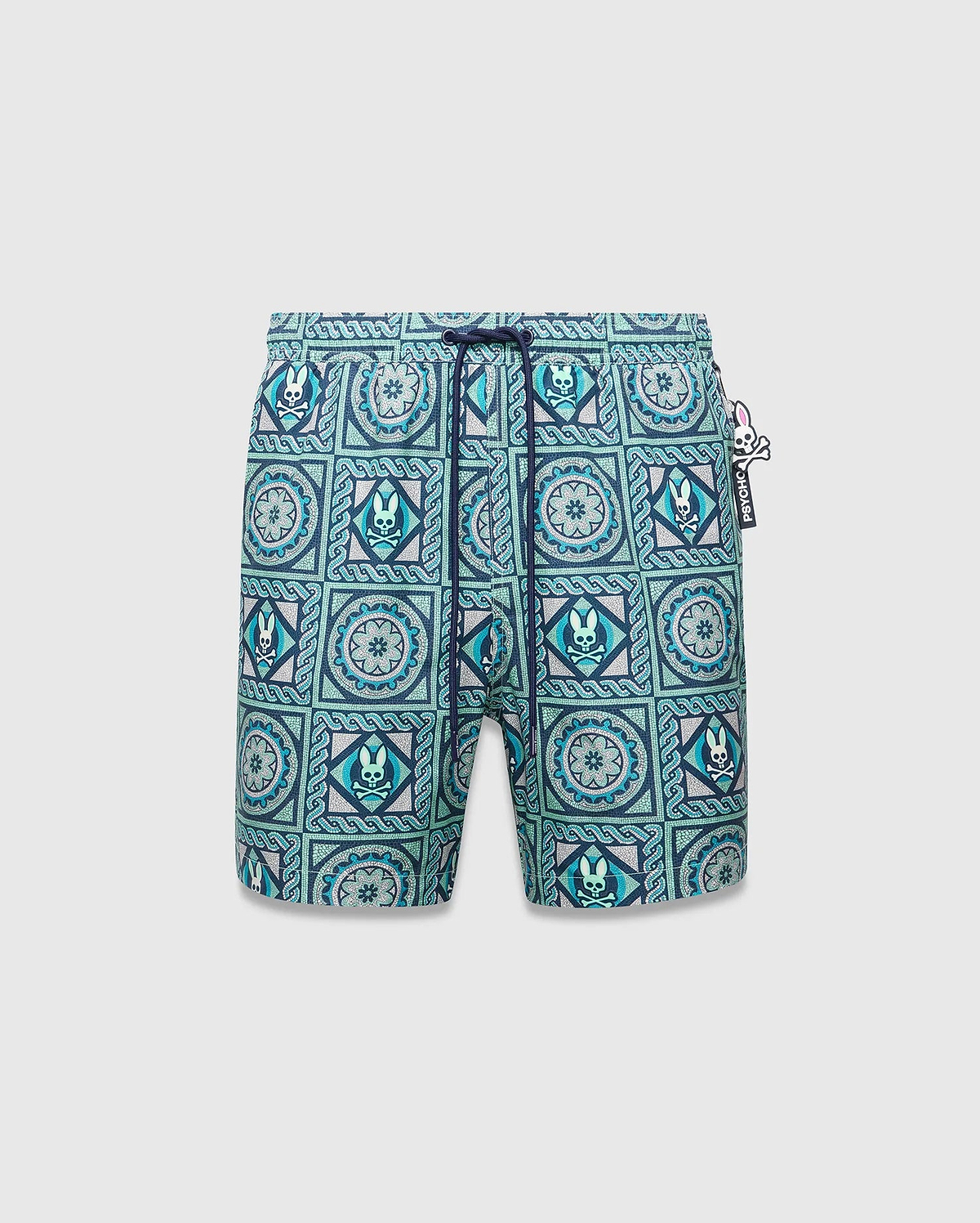 Mens Frank Swim Trunk 6, classic fit, vibrant teal, blue, and white mosaic tile pattern with repeated Psycho Bunny skull logos, floral motifs, dark blue drawstring, and a Psycho Bunny hip tag. (5)