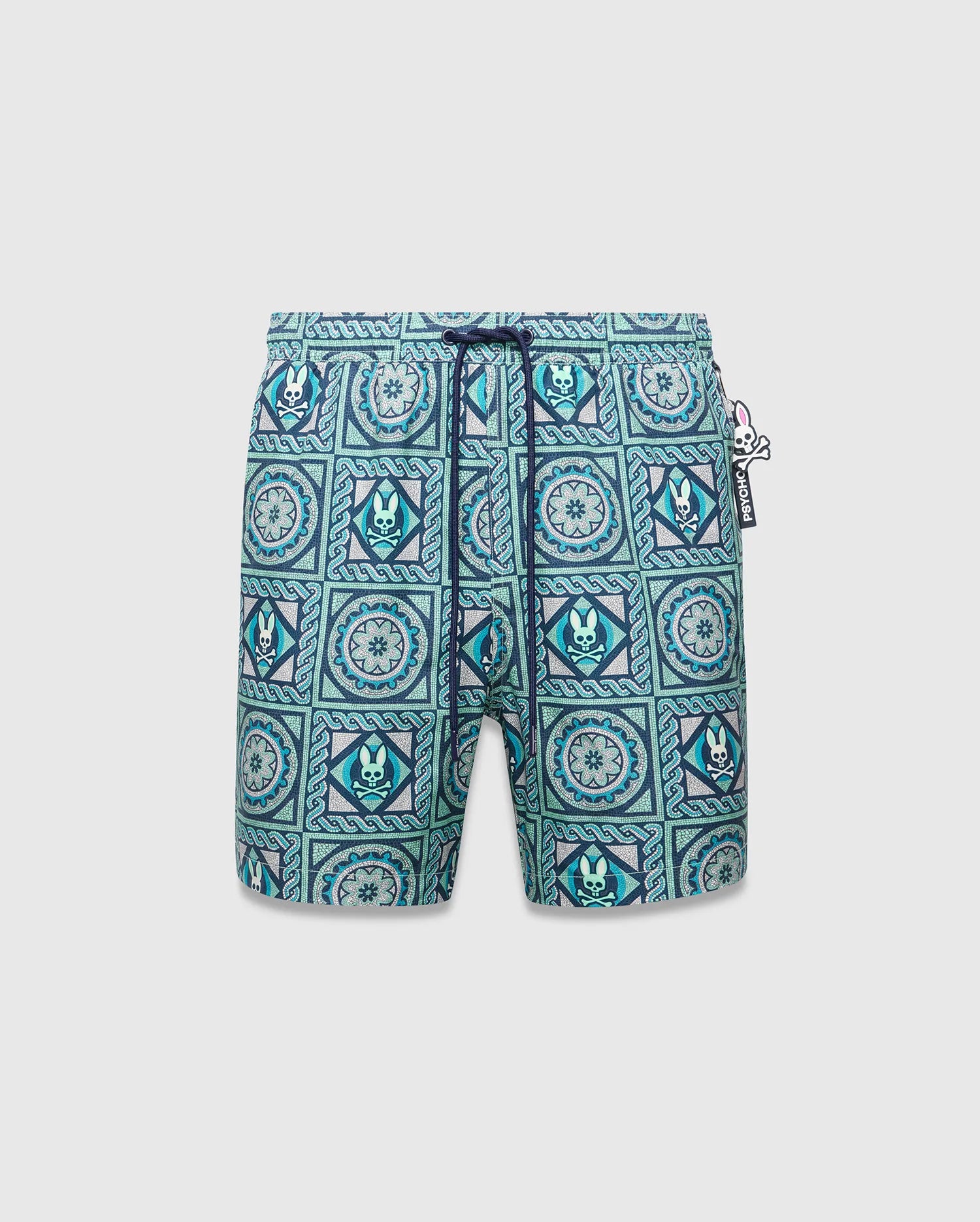 Mens Frank Swim Trunk 6, classic fit, vibrant teal, blue, and white mosaic tile pattern with repeated Psycho Bunny skull logos, floral motifs, dark blue drawstring, and a Psycho Bunny hip tag. (5)
