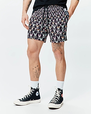 Mens Byron Swim Trunk 6, black with a vibrant all-over multicolored Psycho Bunny skull and crossbones print, classic fit, smooth fabric, and a small logo tag on the pocket. (1)