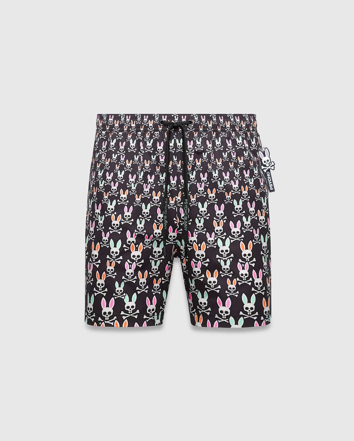 Mens Byron Swim Trunk 6, black with an all-over multi-color Psycho Bunny skull and crossbones print, featuring a small white Psycho Bunny logo tag on the right side, in a relaxed fit quick-dry fabric. (5)