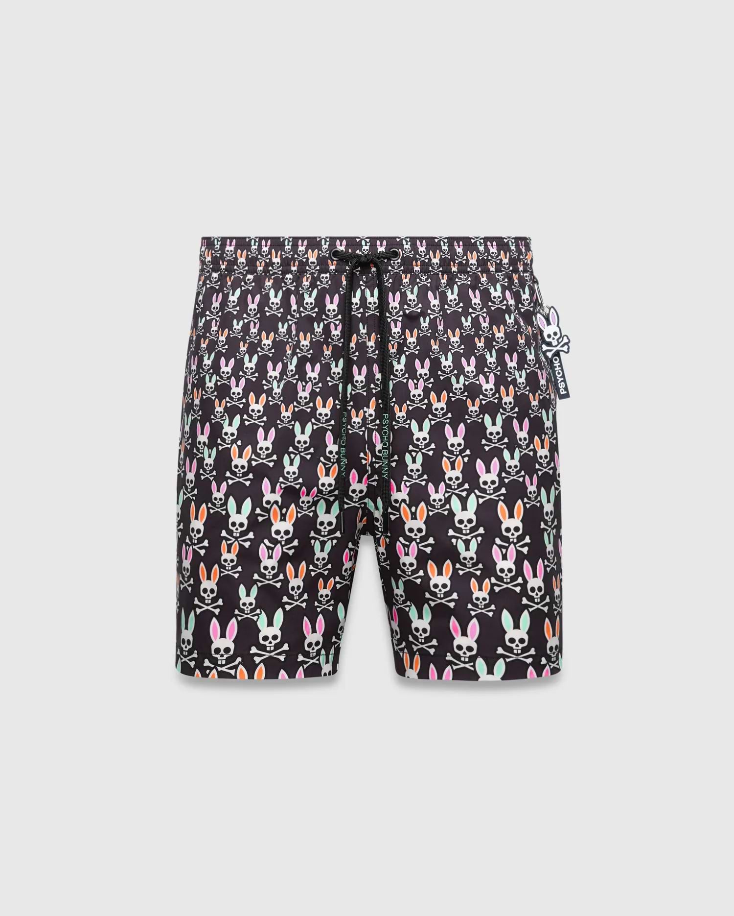 Mens Byron Swim Trunk 6, black with an all-over multi-color Psycho Bunny skull and crossbones print, featuring a small white Psycho Bunny logo tag on the right side, in a relaxed fit quick-dry fabric. (5)