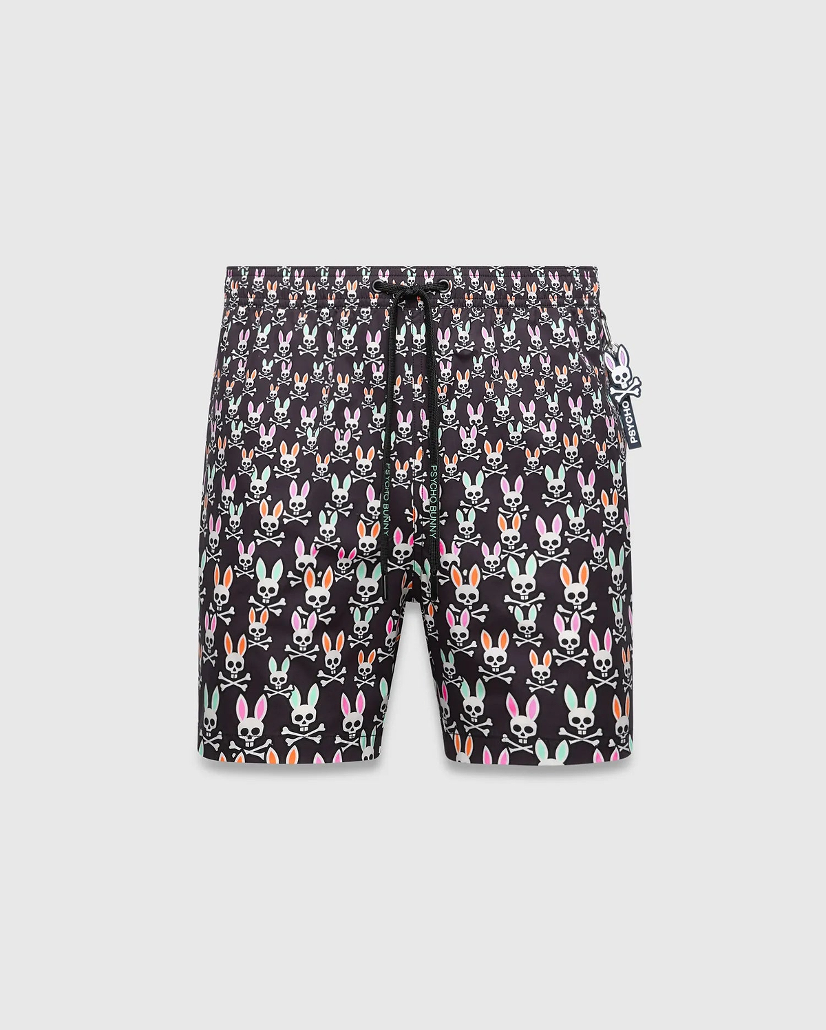 Mens Byron Swim Trunk 6, black with an all-over multi-color Psycho Bunny skull and crossbones print, featuring a small white Psycho Bunny logo tag on the right side, in a relaxed fit quick-dry fabric. (5)