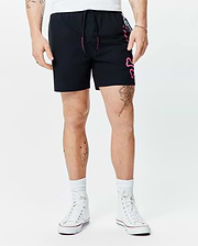 Mens Duncan Bunny Print Swim Trunk in black, featuring a large pink outline bunny skull graphic on the left leg, pink Psycho Bunny text on the drawstring, and side tape. Smooth fabric, classic fit.