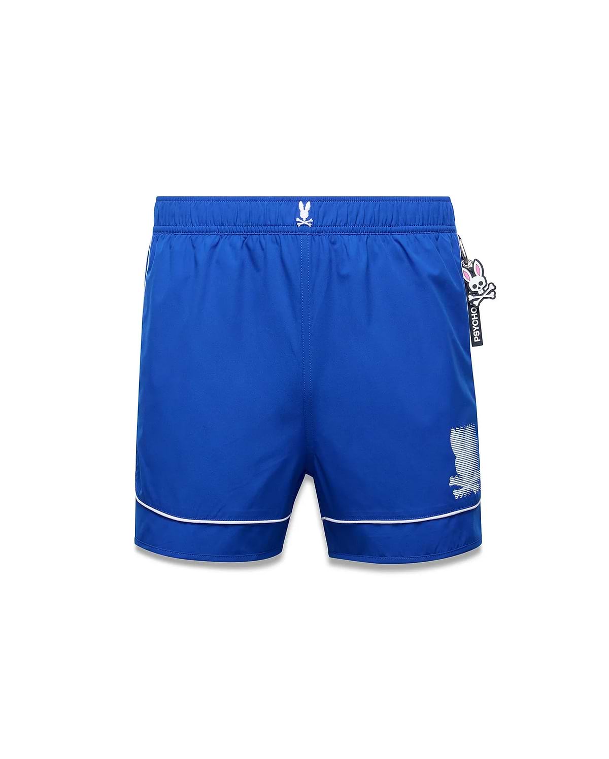 Mens Nathaniel Swim Trunk, royal blue, with white piping, small embroidered Psycho Bunny skull logo on left hip, large white striped graphic logo on right leg, and a black and pink Psycho Bunny tag.