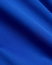 Vibrant royal blue Mens Nathaniel Swim Trunk, featuring a smooth, durable, finely woven fabric with a subtle, quick-drying texture, perfect for active wear.