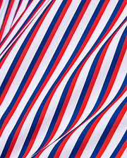 Mens John All Over Print Swim Trunk featuring a vibrant diagonal stripe pattern in white, bold red, and deep blue, on a smooth, flowing fabric.