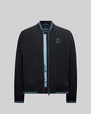 Mens Aldrin Bomber jacket in black, featuring a classic fit, smooth fabric, light blue and white striped ribbed collar, cuffs, and hem, with a small embroidered light blue Psycho Bunny skull logo on the left chest.