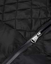 Mens Emerik Puffer Jacket in black quilted nylon, featuring a full-zip closure with a metallic Psycho Bunny skull logo embossed on the zipper pull.