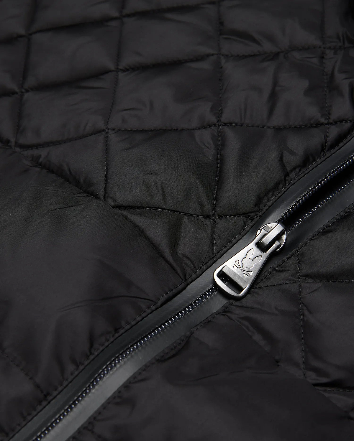 Mens Emerik Puffer Jacket in black quilted nylon, featuring a full-zip closure with a metallic Psycho Bunny skull logo embossed on the zipper pull.