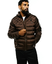 Mens Emerik Hooded Puffer Jacket in rich brown, featuring a quilted upper, horizontal puffer channels, a full zip, and a small black embroidered Psycho Bunny skull logo on the left chest.