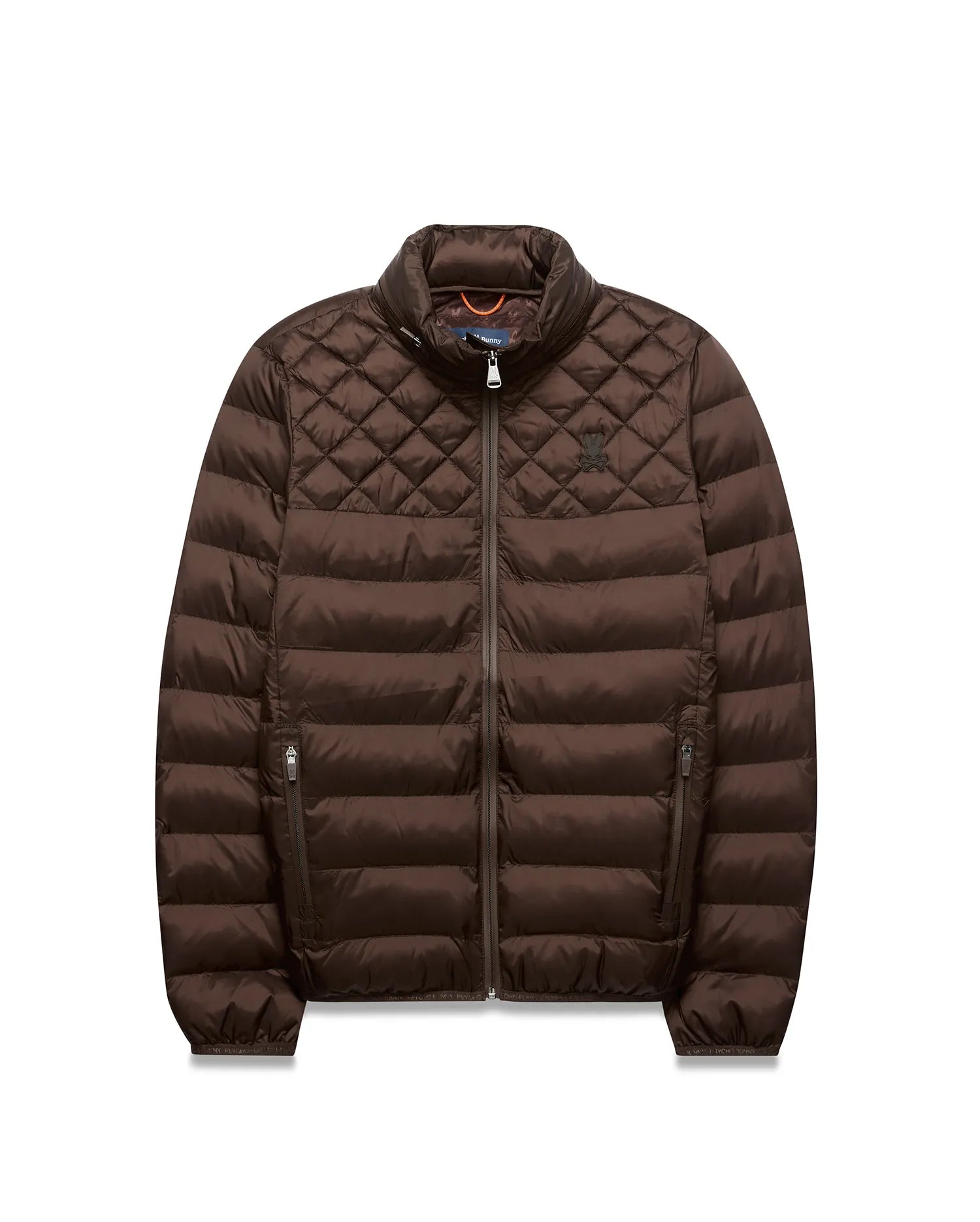 Mens Emerik Puffer Jacket, brown, with diamond quilted shoulders, horizontal body quilting, full zip, stand collar, and small embroidered Psycho Bunny skull logo on left chest; orange inner collar.
