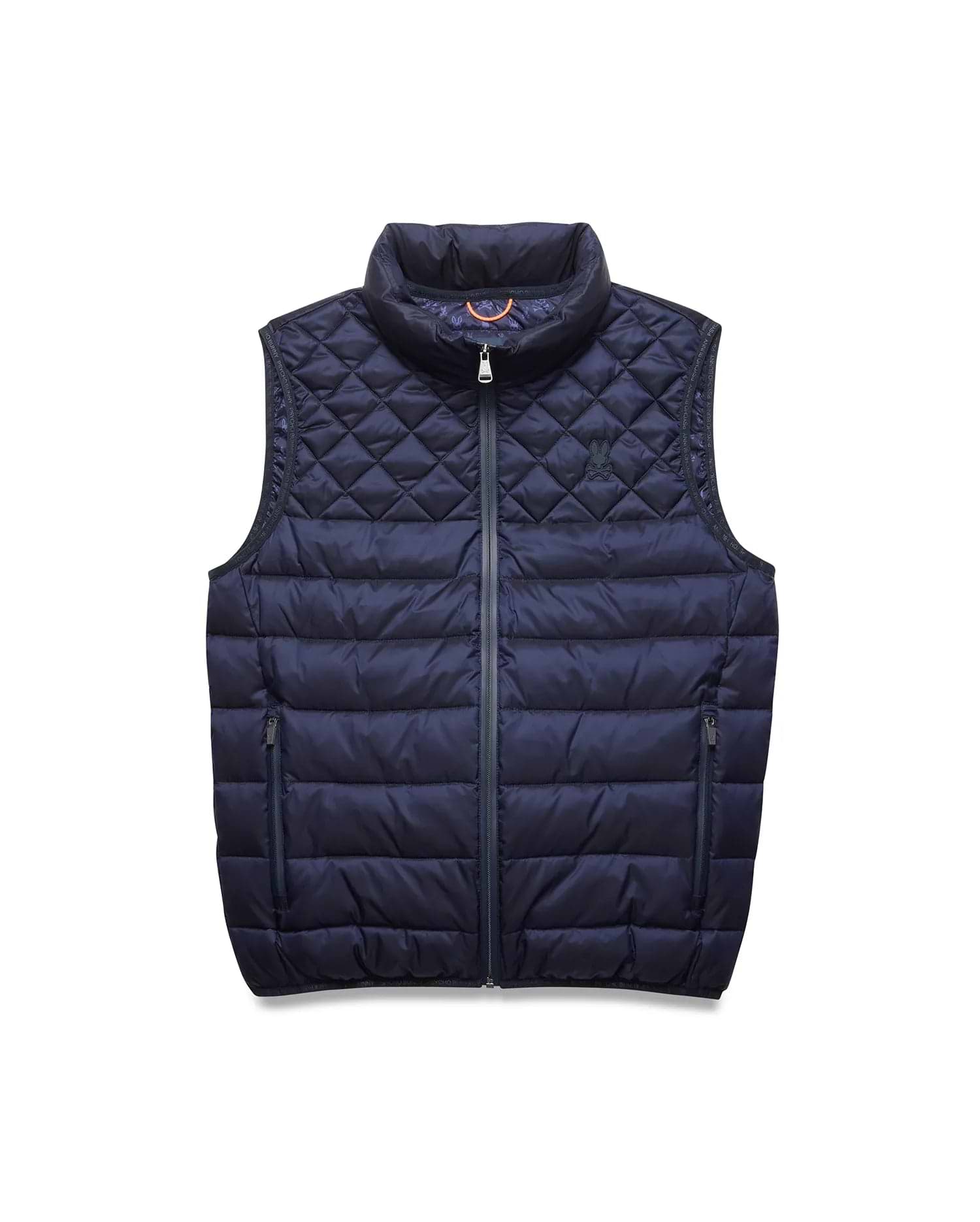 Mens Emerik Puffer Vest in navy, featuring a quilted upper with an embroidered Psycho Bunny skull logo, horizontal baffles on the lower body, full zip, and zippered pockets. Orange accent inside collar.