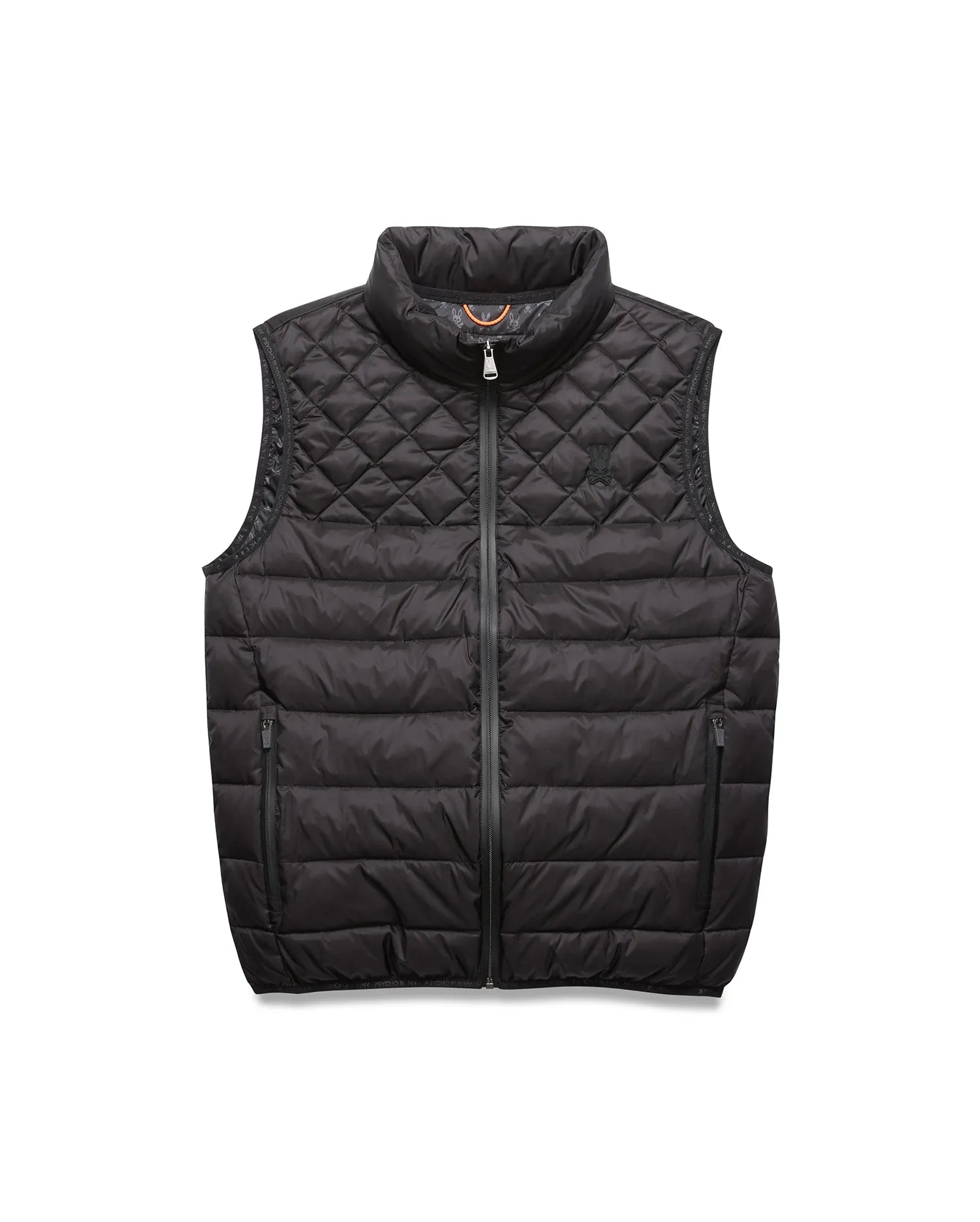 Black Mens Emerik Puffer Vest with quilted upper, horizontal baffles, small embroidered Psycho Bunny skull logo on left chest, full zip, and orange inner collar featuring repeating branding.