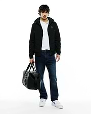 Black Mens Gordley Mix Media Jacket, a hooded full-zip with quilted body panels, smooth sleeves, and a small embroidered Psycho Bunny skull logo on the left chest. (4)