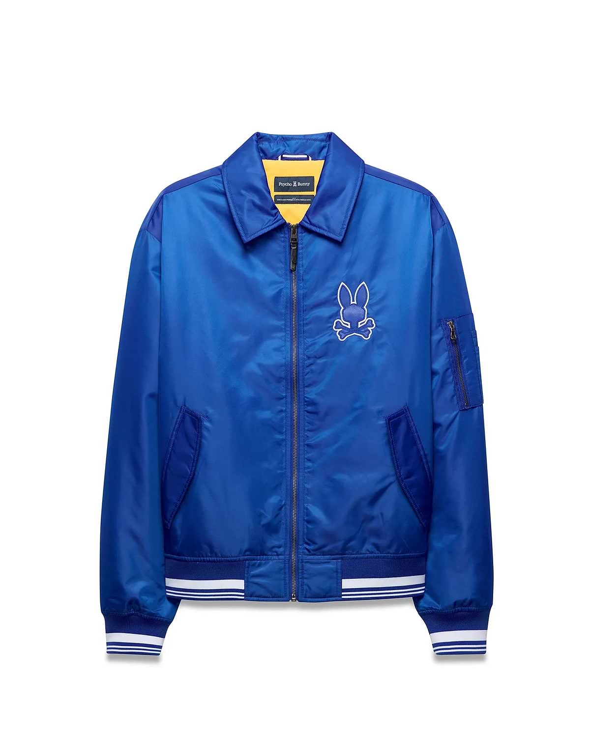 Mens Nathaniel Satin Coach Jacket, royal blue satin, full-zip, ribbed cuffs/hem with white stripes, zippered sleeve pocket, and large white embroidered Psycho Bunny skull logo on left chest. (6)