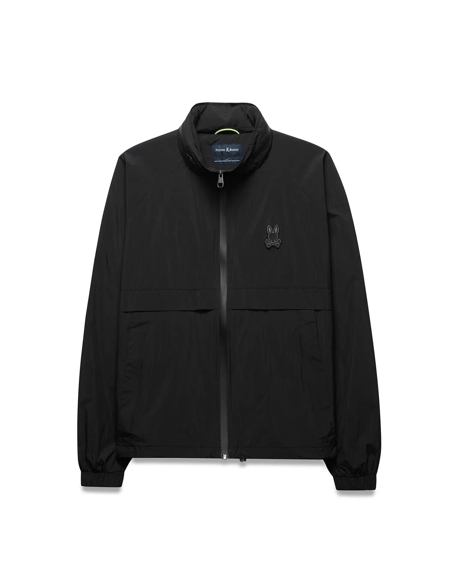 Black Mens Javier Windbreaker Jacket with a classic fit, smooth fabric, full zip, stand collar with neon green accent, elastic cuffs and hem, and a small dark grey embroidered Psycho Bunny skull logo on the left chest. (5)
