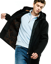 MENS LUTHER WOOL BLEND COAT, a black hooded classic fit coat with button closure, featuring a quilted black lining with an orange Psycho Bunny skull and crossbones pattern and a small embroidered logo on the sleeve.