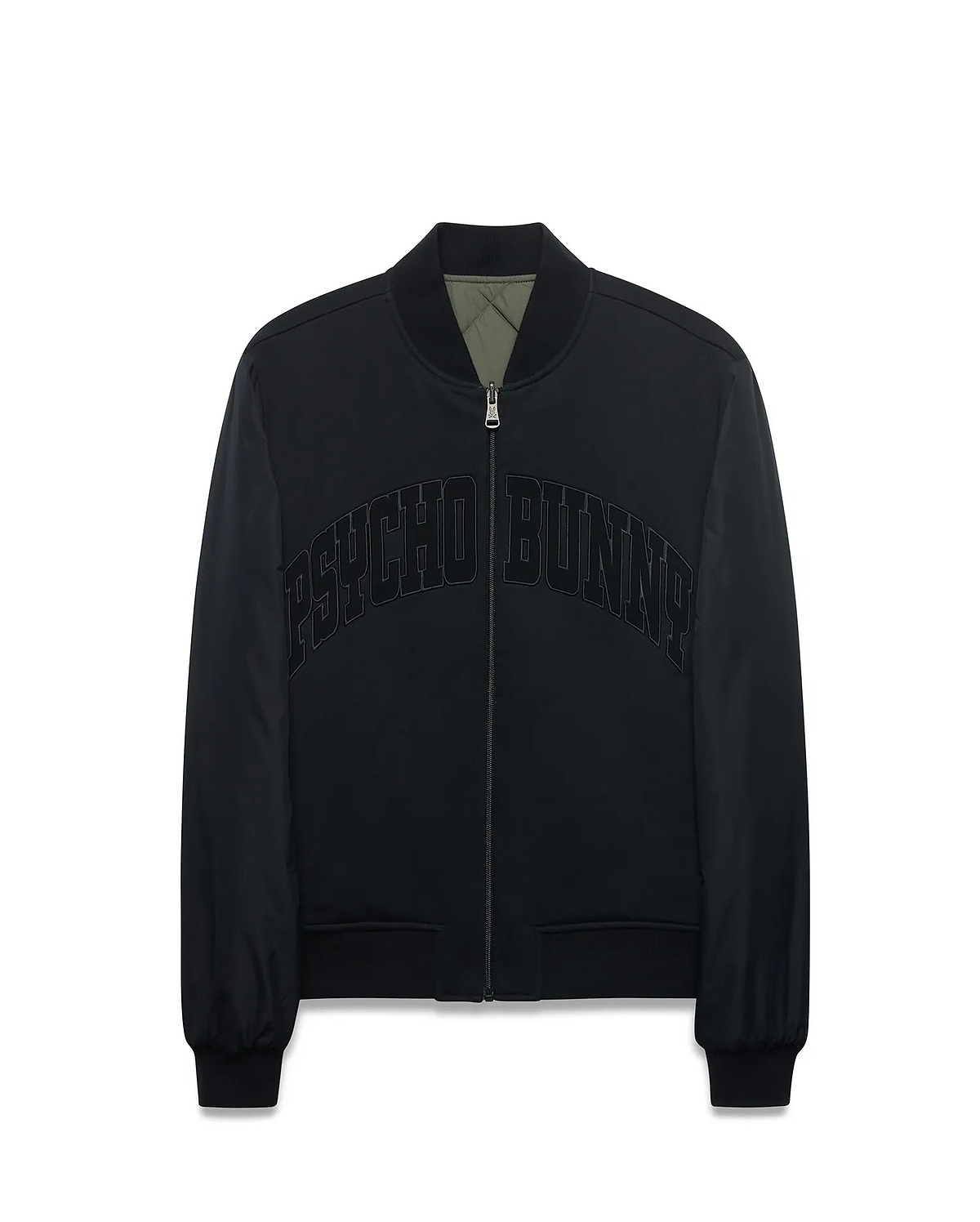 Mens Joaquin Mix Media Reversible Bomber in black with large tonal PSYCHO BUNNY chest text, full zip with skull logo pull, ribbed trim, and olive green quilted reverse side.