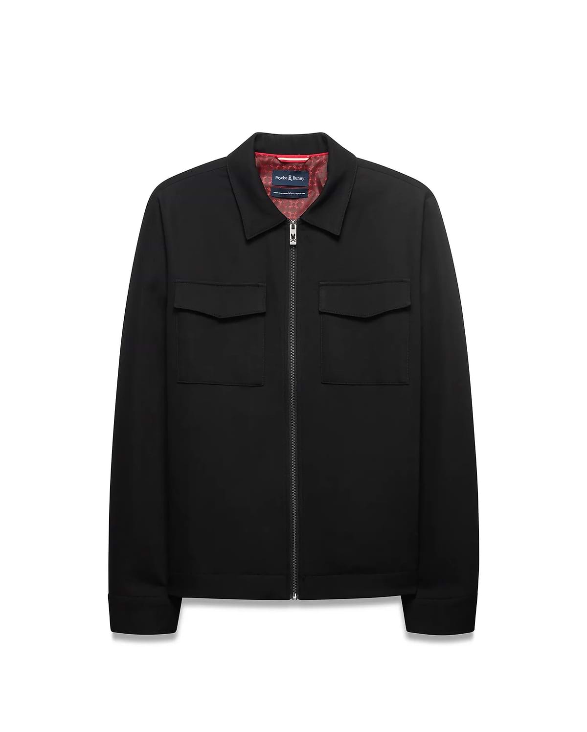Men's Wayde Twill Overshirt, a black full-zip jacket with a classic fit, two chest flap pockets, a red patterned lining, and a small Psycho Bunny skull logo on the zipper pull. (5)