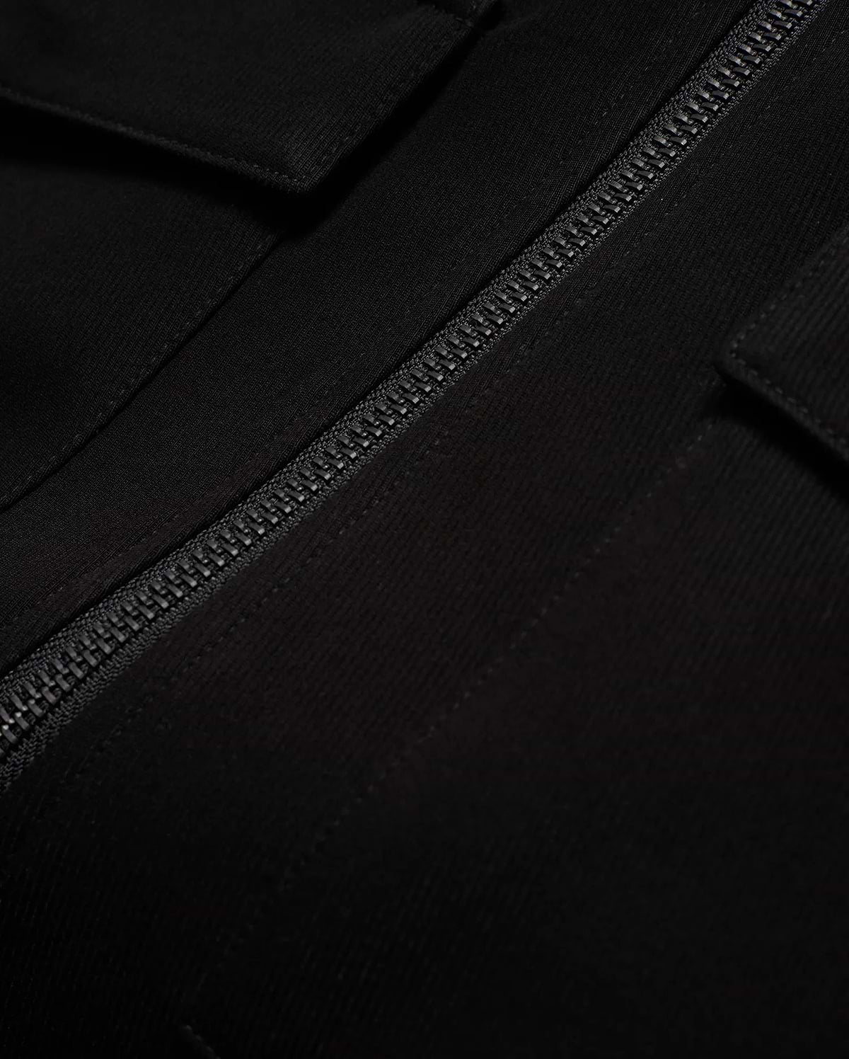 Men's Wayde Twill Overshirt, a premium black twill overshirt with a relaxed fit, featuring a prominent black zipper and a subtle flap pocket detail. (6)