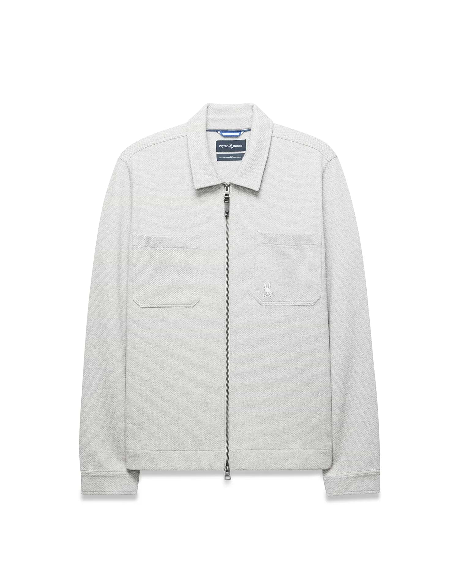 Light Grey Mens Marc Textured Overshirt with a classic fit, full zip, collared neckline, two chest patch pockets, and a small embroidered Psycho Bunny skull logo on the right pocket. (6)