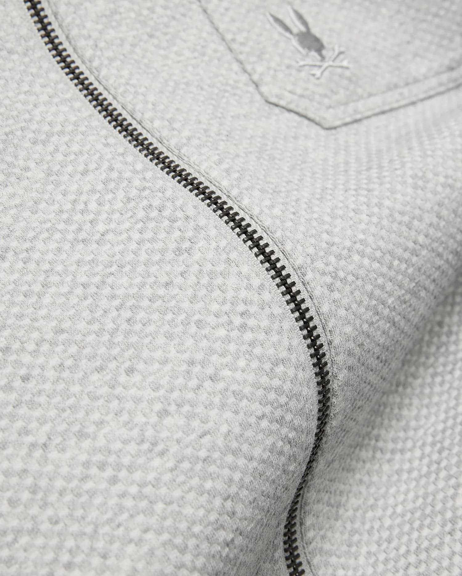 Mens Marc Textured Overshirt in light grey, featuring a subtle textured knit, dark grey full-zip, and a small embroidered Psycho Bunny skull logo on the chest pocket. (7)