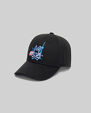 The Psycho Bunny MENS TORONTO BASEBALL CAP (MO1500049) has an adjustable back, a black front with embroidered Bunny graphic, crossed bones, city tower and red-blue building. Light gray background for a modern look.