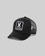Mens Adamo Trucker Cap, black cotton twill front with a large white embroidered Psycho Bunny skull logo and text in a rectangular border, featuring a breathable black mesh back.