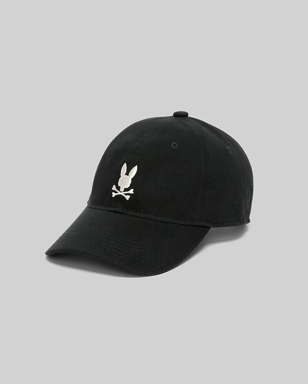 Black Jimmy Baseball Cap with a classic fit, featuring a prominent white embroidered Psycho Bunny skull logo on the front, made from durable cotton twill.