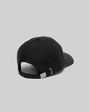 Jimmy Baseball Cap in black cotton twill, featuring a classic fit and an adjustable strap with a silver metal buckle engraved with the iconic Psycho Bunny skull logo at the back.
