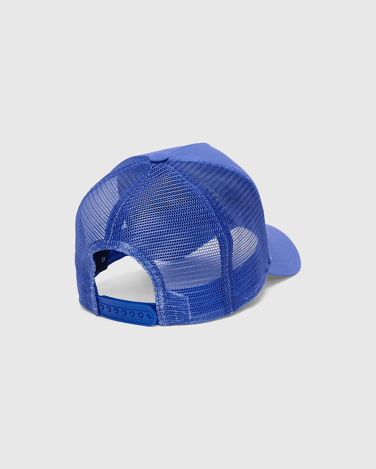 Mens Tobias Trucker Cap in royal blue, featuring a breathable mesh back, adjustable snapback closure, and a small embroidered Psycho Bunny skull logo on the left side.