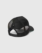 Mens Apollo Trucker Cap in black, featuring breathable mesh back panels, an adjustable snapback closure, and a subtle blue underside brim. Psycho Bunny branding is visible on the inner band.
