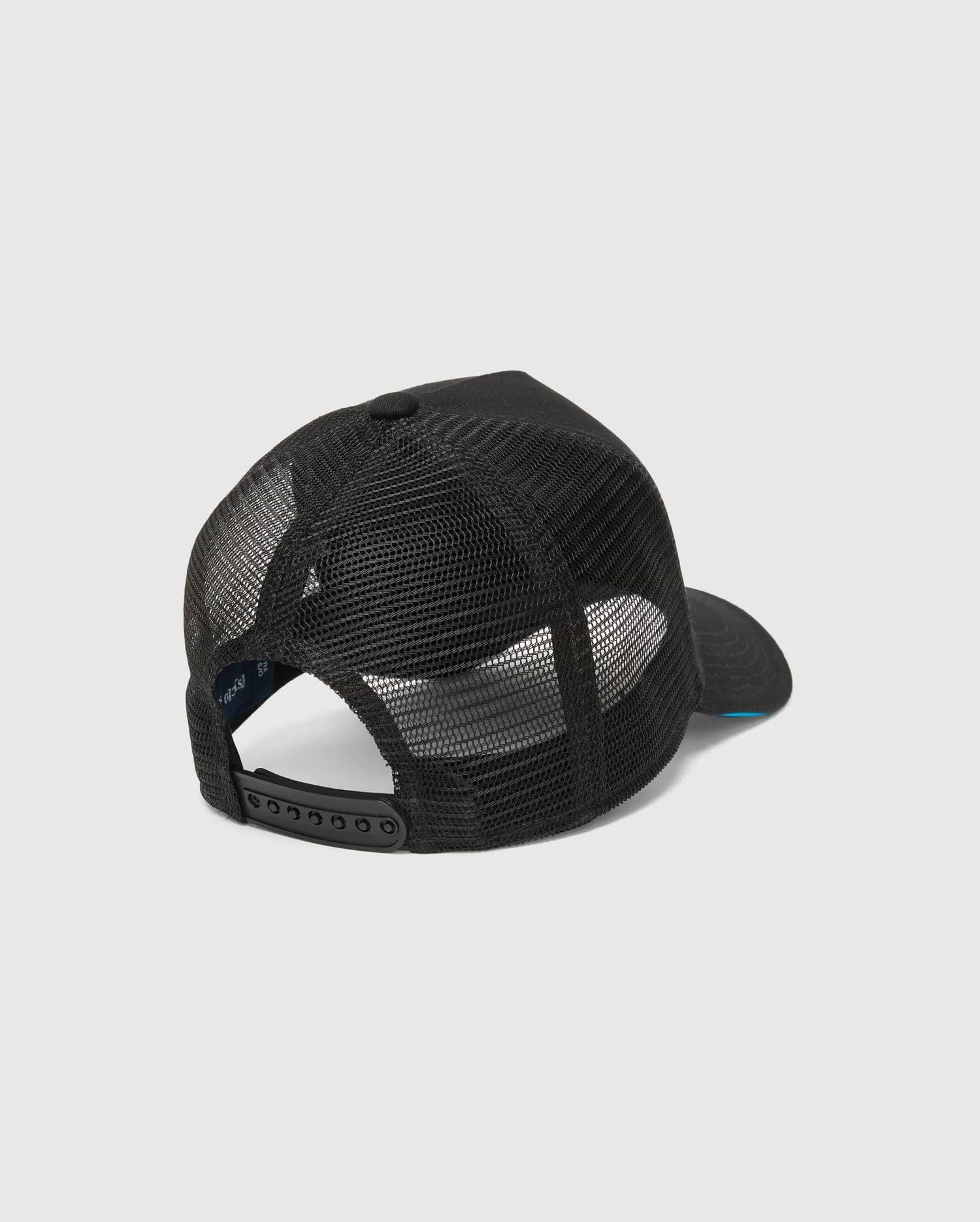 Mens Apollo Trucker Cap in black, featuring breathable mesh back panels, an adjustable snapback closure, and a subtle blue underside brim. Psycho Bunny branding is visible on the inner band.