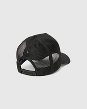 Mens Apollo Trucker Cap in black, featuring breathable mesh back panels, an adjustable snapback closure, and a subtle blue underside brim. Psycho Bunny branding is visible on the inner band.