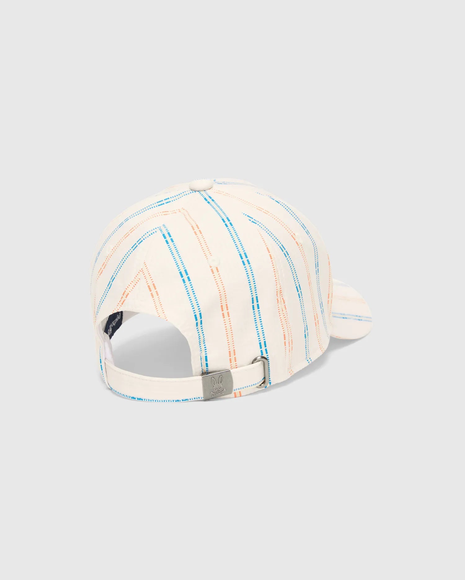 Mens Antoine Seersucker Baseball Cap, cream with blue and orange dashed vertical stripes, featuring a seersucker texture and a small Psycho Bunny skull logo engraved on the silver-tone adjustable buckle at the back.