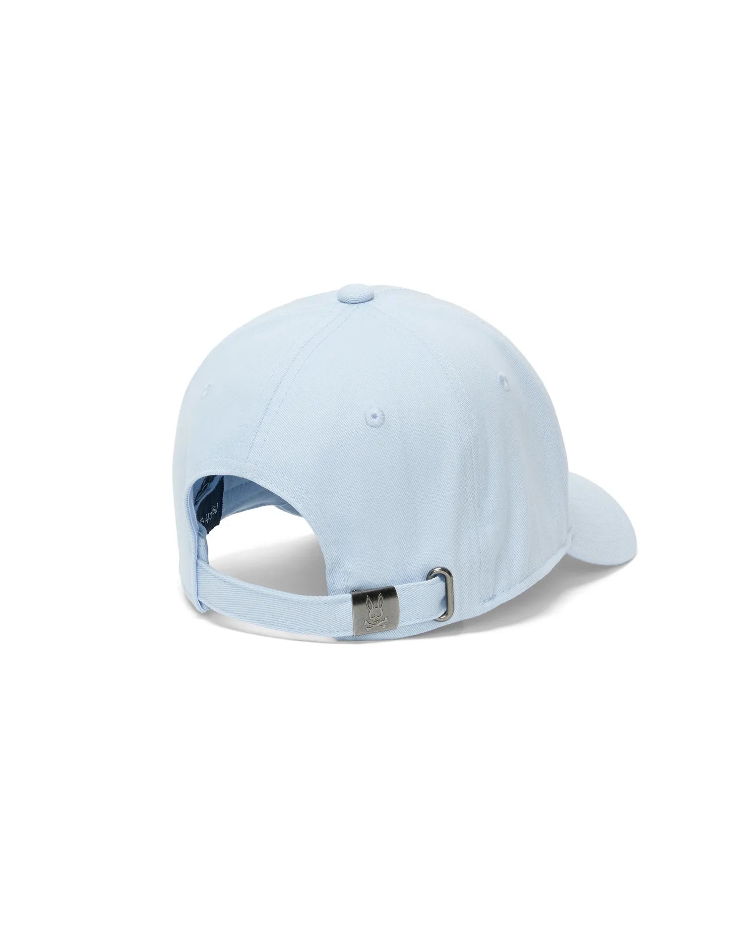Mens Ambrose Baseball Cap, a classic fit in light blue cotton twill, featuring an adjustable strap with a gunmetal buckle engraved with the iconic Psycho Bunny skull logo.