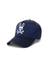 Navy Mens Finnley A-Frame Trucker Cap featuring a prominent white embroidered Psycho Bunny skull logo on the front, crafted from smooth, structured fabric.