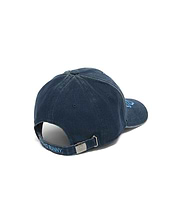 Men's Grover Baseball Cap in dark blue faded denim, featuring light blue embroidered Psycho Bunny text on the adjustable back strap and an engraved bunny skull on the metal buckle. (4)
