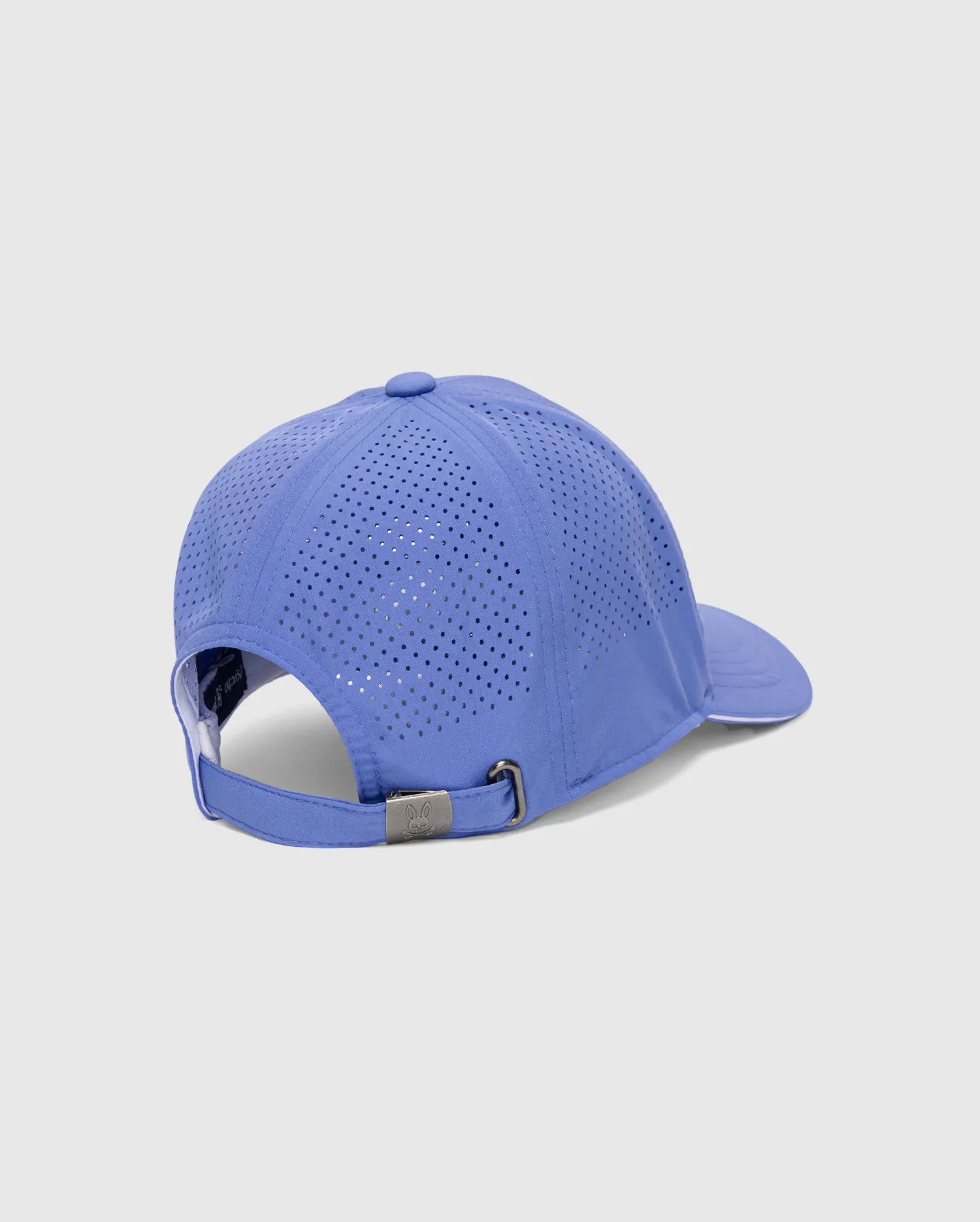 Periwinkle Blue Mens Blaze Sport Cap featuring perforated panels, an adjustable strap, and a metallic buckle with an embossed Psycho Bunny skull logo. (4)